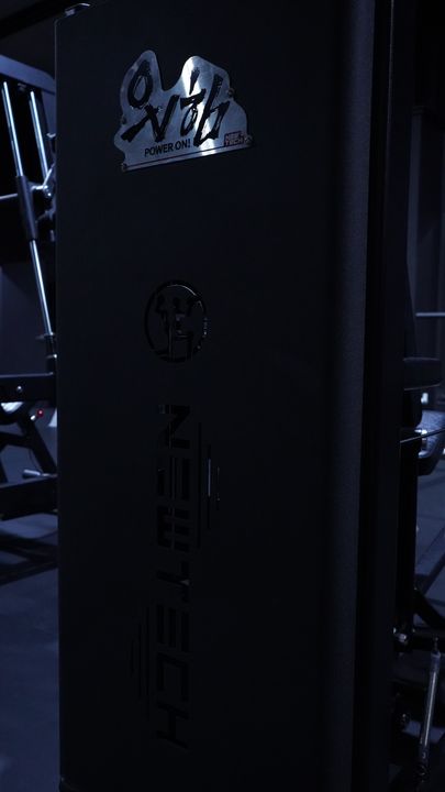 Newtech brand plate on a black weight shroud