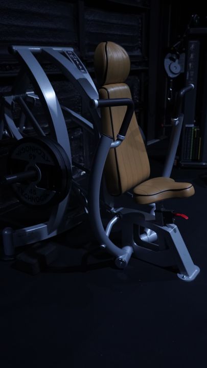 Machine with tan leather seat and silver frame
