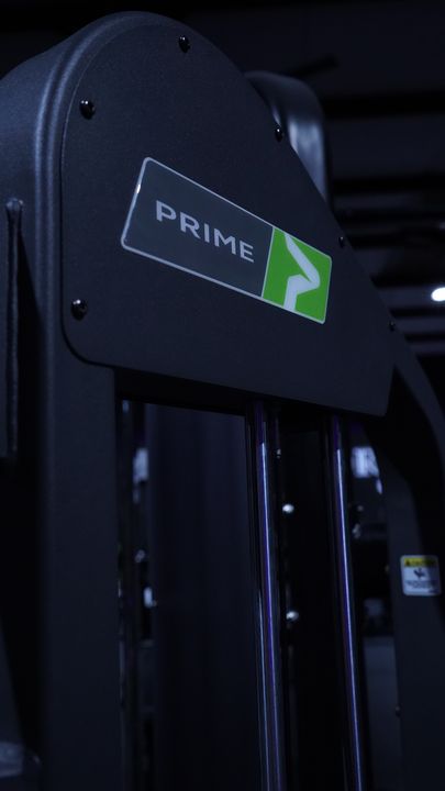 Prime brand plate on a weight stack shroud