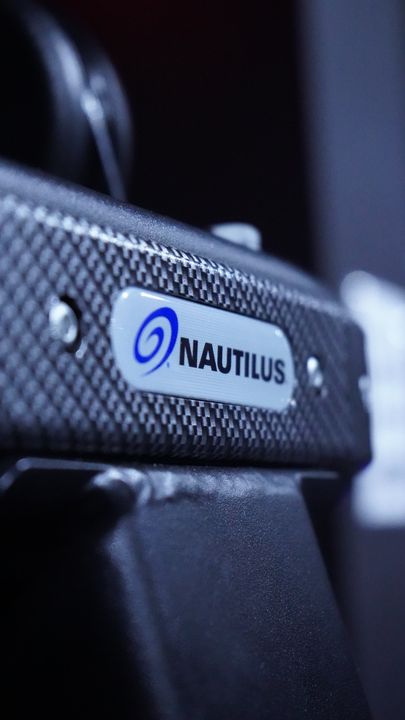 Nautilus badge on a textured grip plate